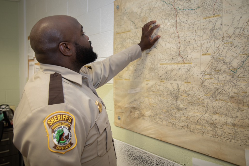 Officer looking over a map.